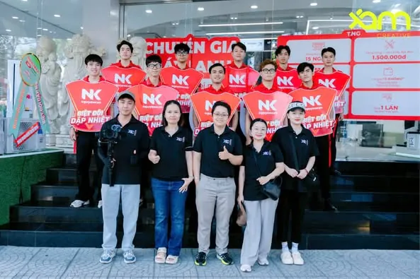 XAM and Nguyen Kim crew with walking billboards