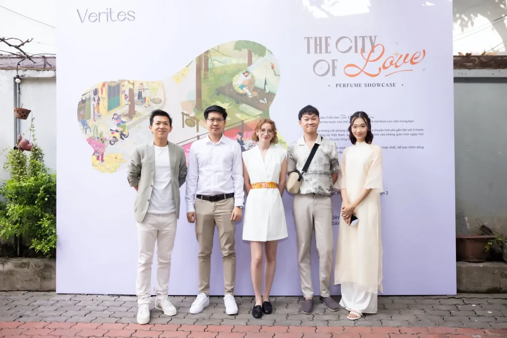 Influencers at the Verites "The City of Love" photo wall
